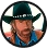 Je ne sais pas qui est sur l'image. Texte alternatif suggéré : "Homme barbu avec chapeau de cowboy noir."