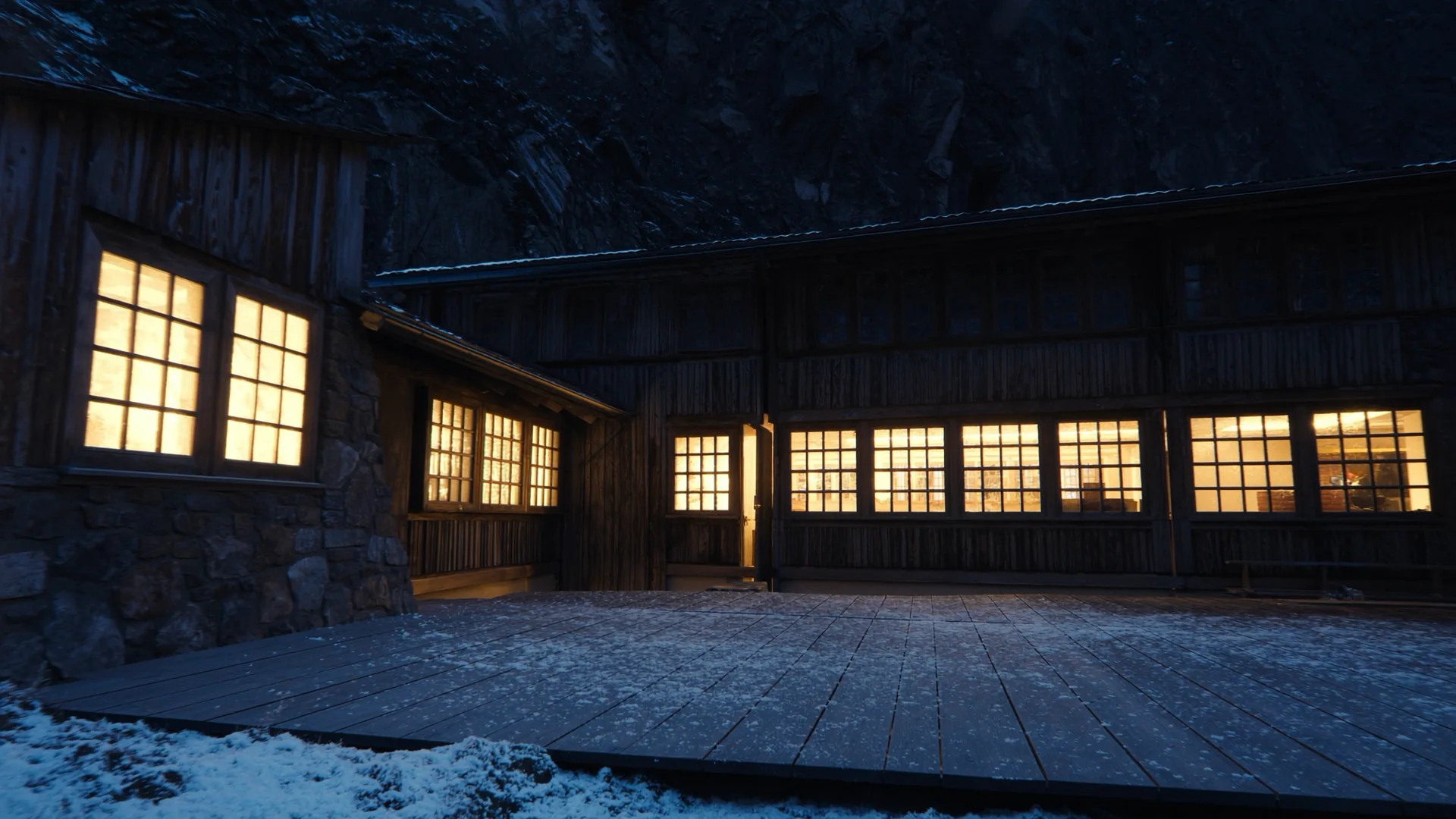 Alpine lodge at blue hour with snow-covered terrace and warm interior light, representing mountain hotel AI visibility measurement